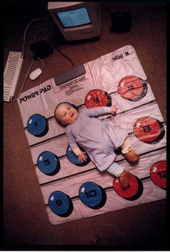 Photograph of an infant using the Baby Babble Blanket